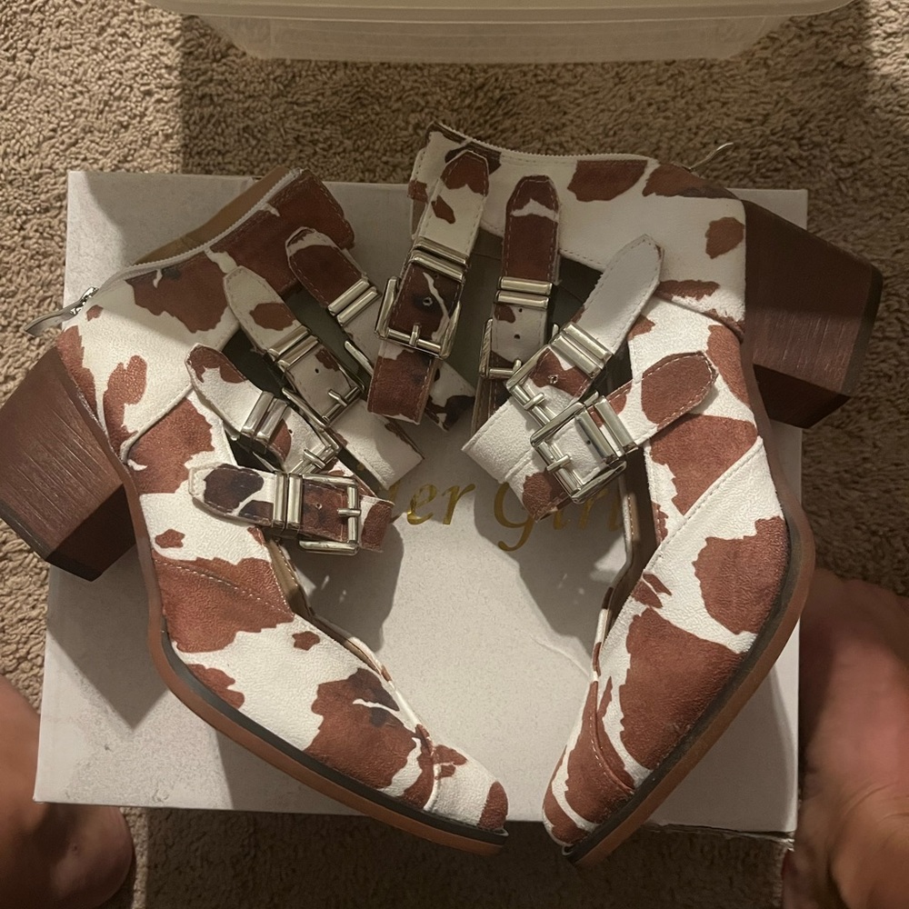 Cow print booties. Never worn outside the house